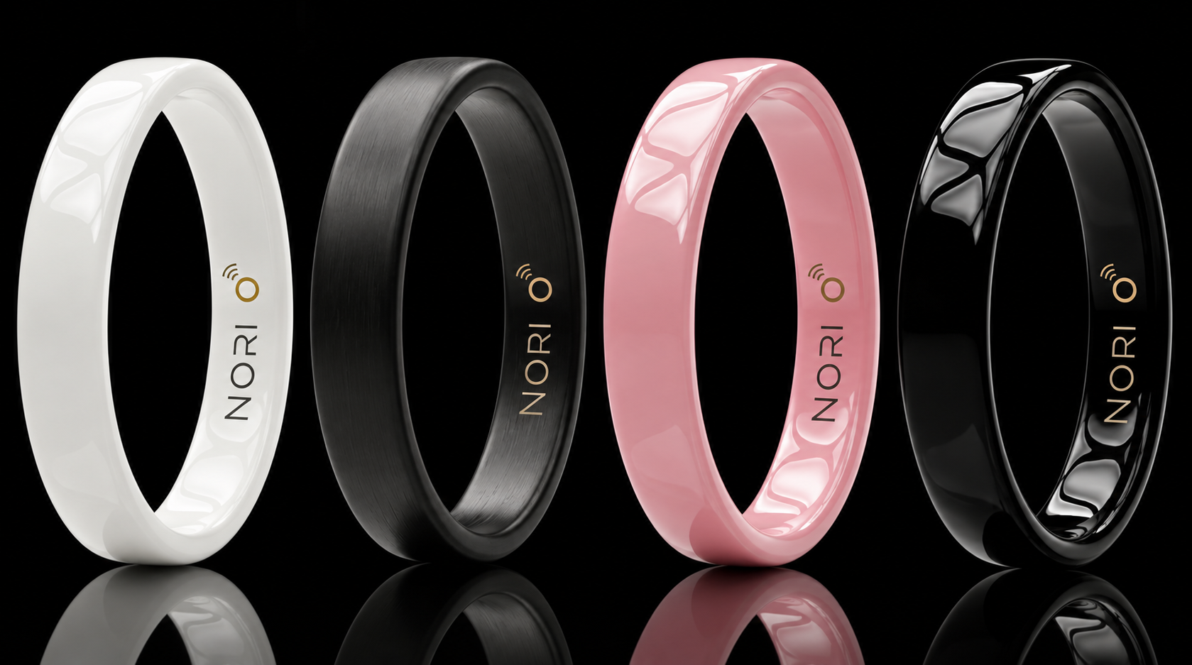 Four branded NORI ceramic payment rings in white, matte black, rose, and gloss black